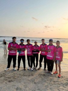 T20 ICL cricket players and selected team members posing at the beach during selection camp tours and tournaments.
